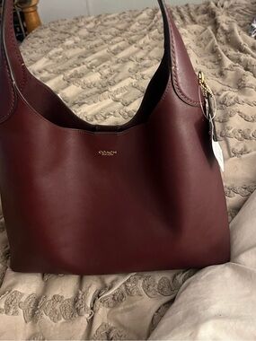 Coach Brooklyn 34 in color Merlot